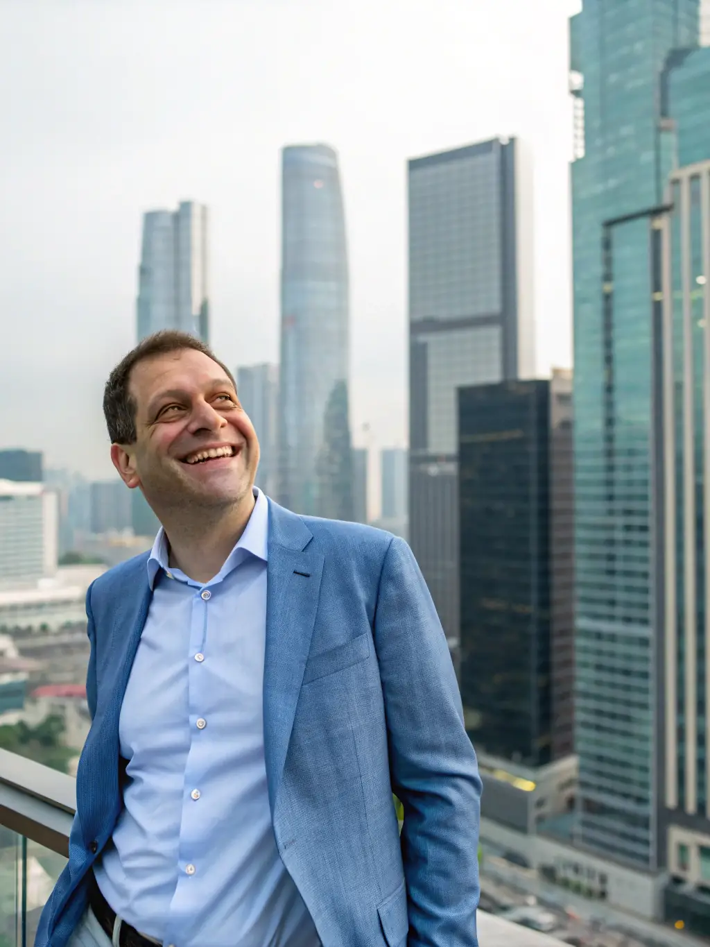 A professional headshot of Tion Joseph, smiling confidently, in a modern office setting, used to introduce him as the lead instructor for the digital marketing courses.